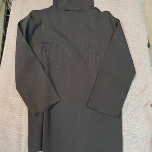 Quest ce Que c'est Black turtle neck